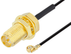 Reverse Polarity SMA Female Bulkhead to UMCX 2.1 Plug Cable 3 Inch Length Using 0.81mm Coax, RoHS - PE3CA1033-3 - Pasternack