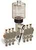 (Formerly B3192-2X19), Multiple Feed Electro Lubricator, 9 oz Polycarbonate Reservoir, 6 Feeds, 120V/60Hz - B3192-009061206B111GW - Oil-Rite Corp.